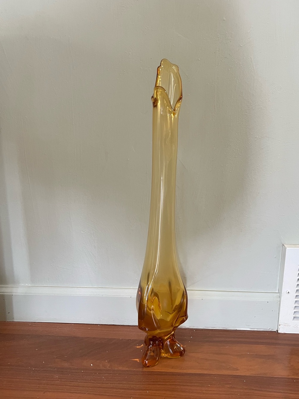 Vintage Viking honey amber glass swung vase 3 toe footed from 1960s Mid
Century